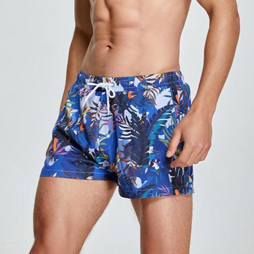 Casual plus size leaf and bird printing pocket beach shorts(size run small)